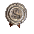 A splendid little French vintage pewter plate depicting an embossed salamander and French coat of arms for King Francois 1st, a very detailed and decorative piece. There is a hanging hook to the rear and also a maker's mark