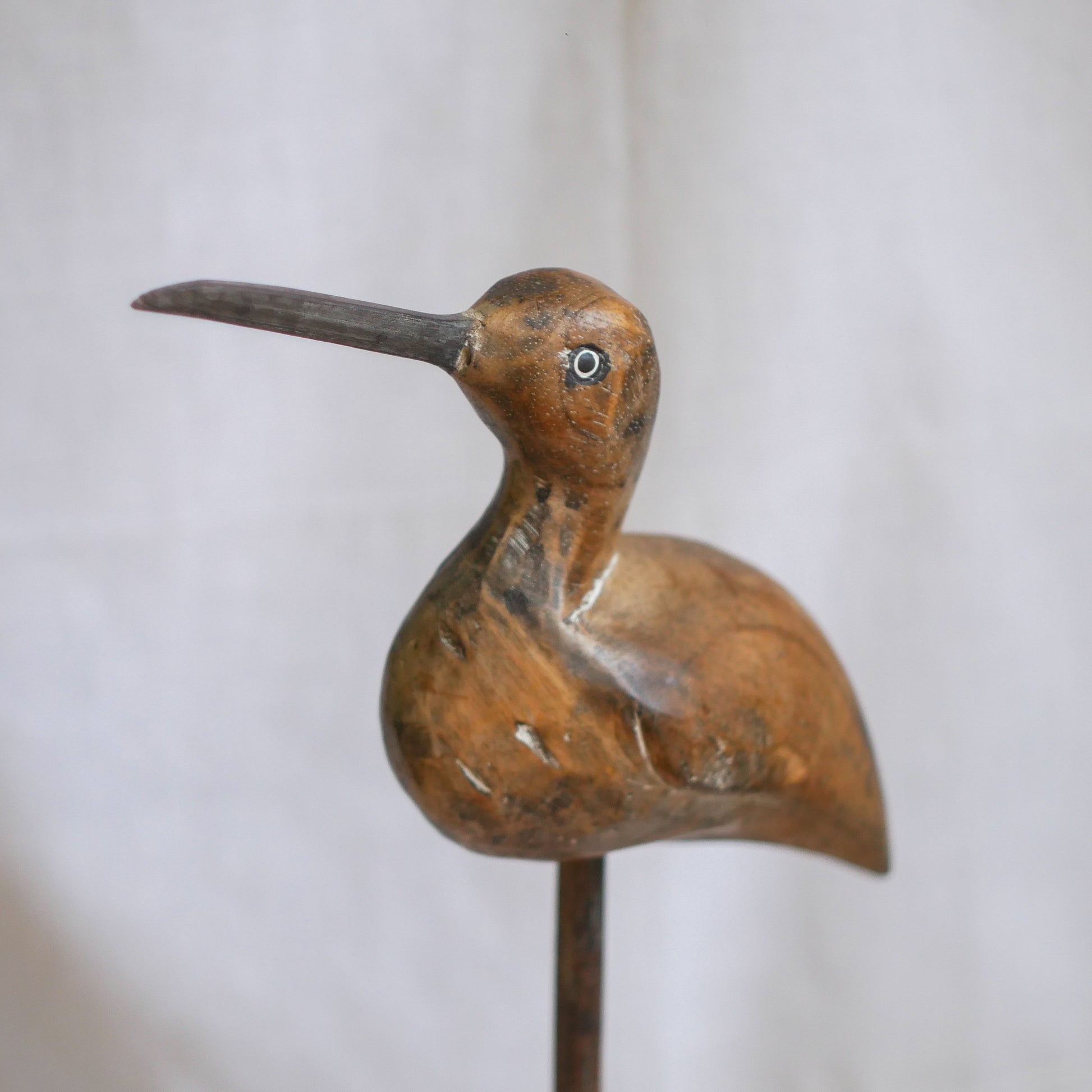 An attractive vintage wooden bird ornament, a piece of primitive folk art purchased here in France. This wonderful bird will make excellent decor in any interior and is also very cute!