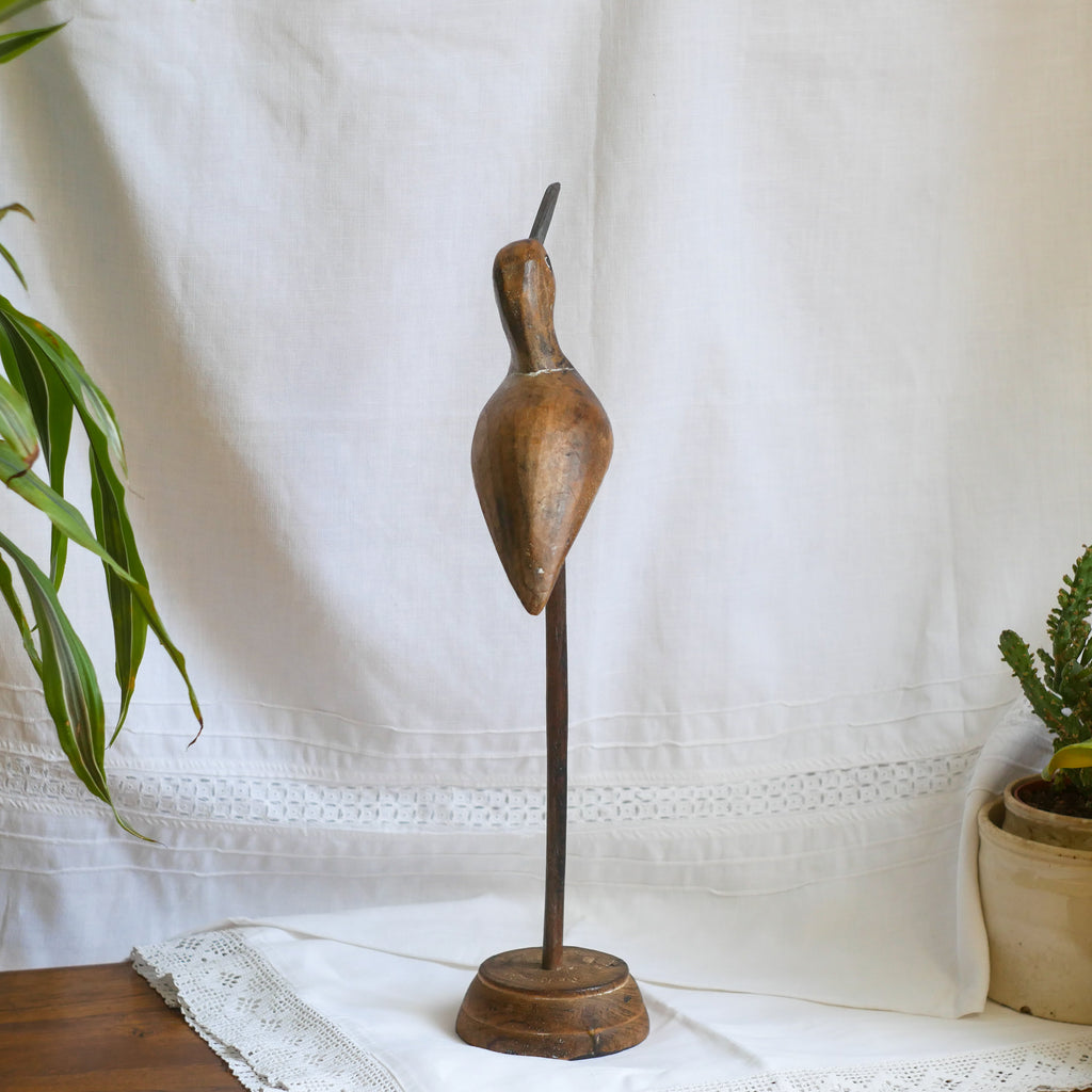 An attractive vintage wooden bird ornament, a piece of primitive folk art purchased here in France. This wonderful bird will make excellent decor in any interior and is also very cute!