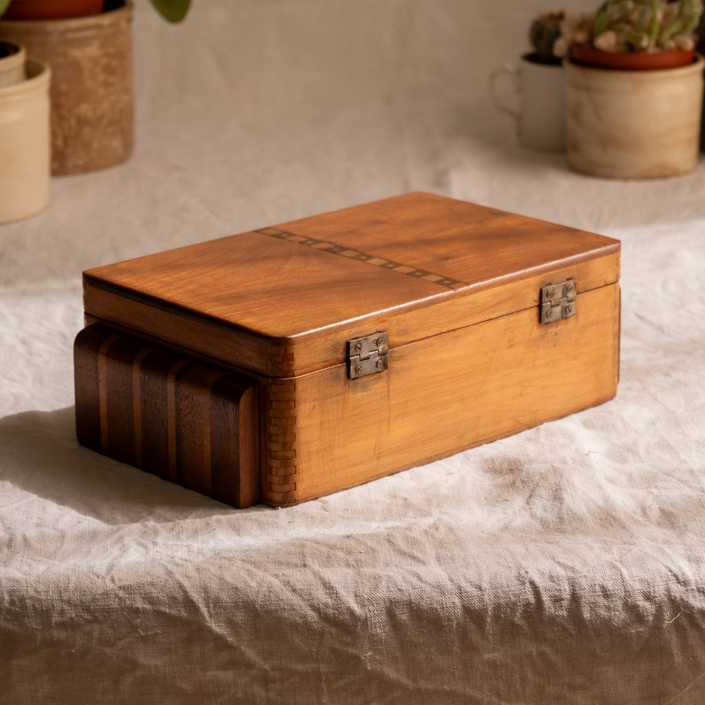 A beautiful French vintage wooden box, a hand-made piece with dove-tailed joints and inlaid design pattern - the colour of the wood is a wonderful golden brown and the hinges are strong. In summary a beautiful vintage box which makes an attractive piece of practical home decor.
