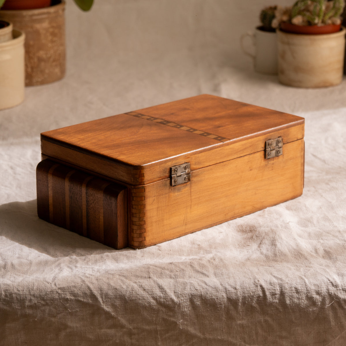 A beautiful French vintage wooden box, a hand-made piece with dove-tailed joints and inlaid design pattern - the colour of the wood is a wonderful golden brown and the hinges are strong. In summary a beautiful vintage box which makes an attractive piece of practical home decor.