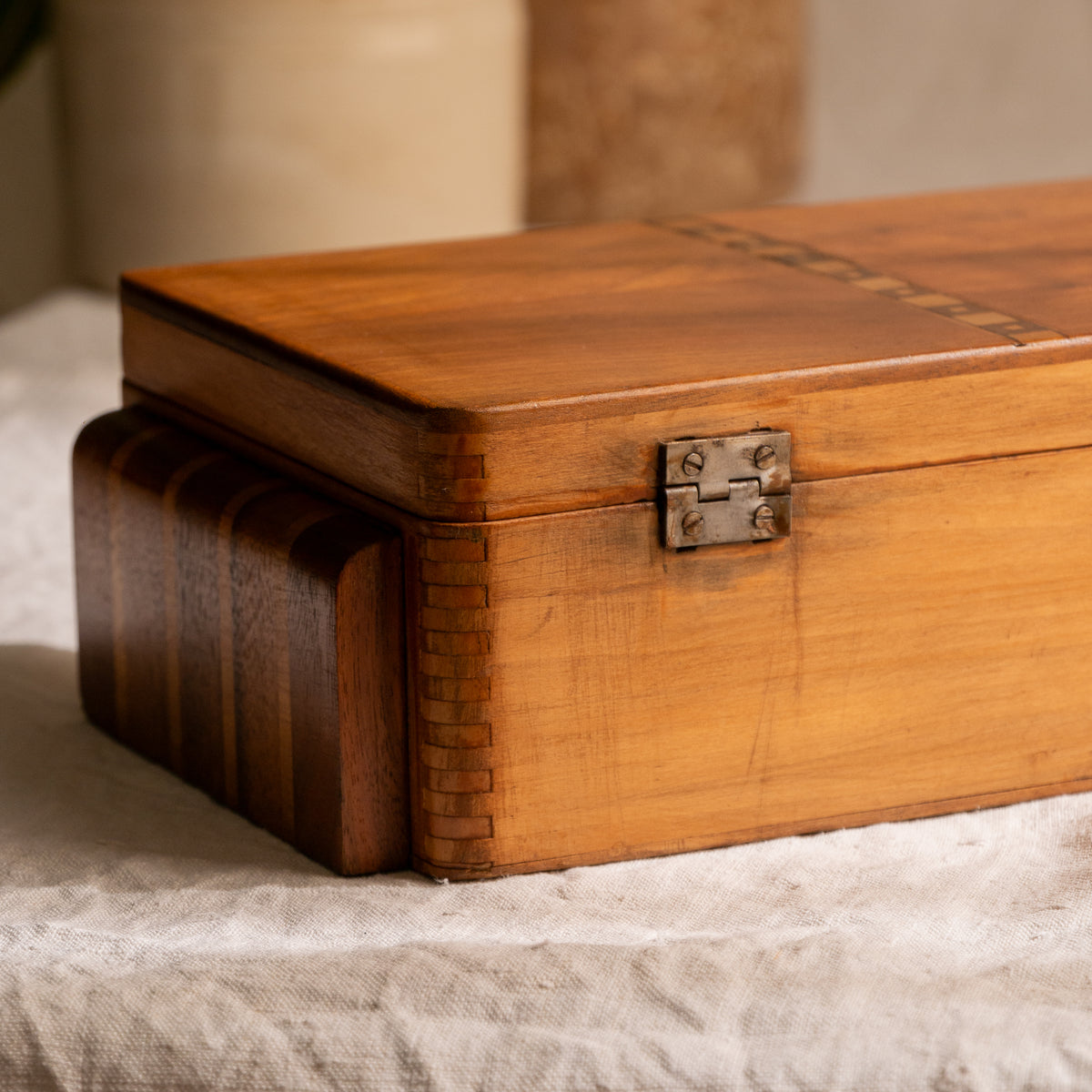 A beautiful French vintage wooden box, a hand-made piece with dove-tailed joints and inlaid design pattern - the colour of the wood is a wonderful golden brown and the hinges are strong. In summary a beautiful vintage box which makes an attractive piece of practical home decor.