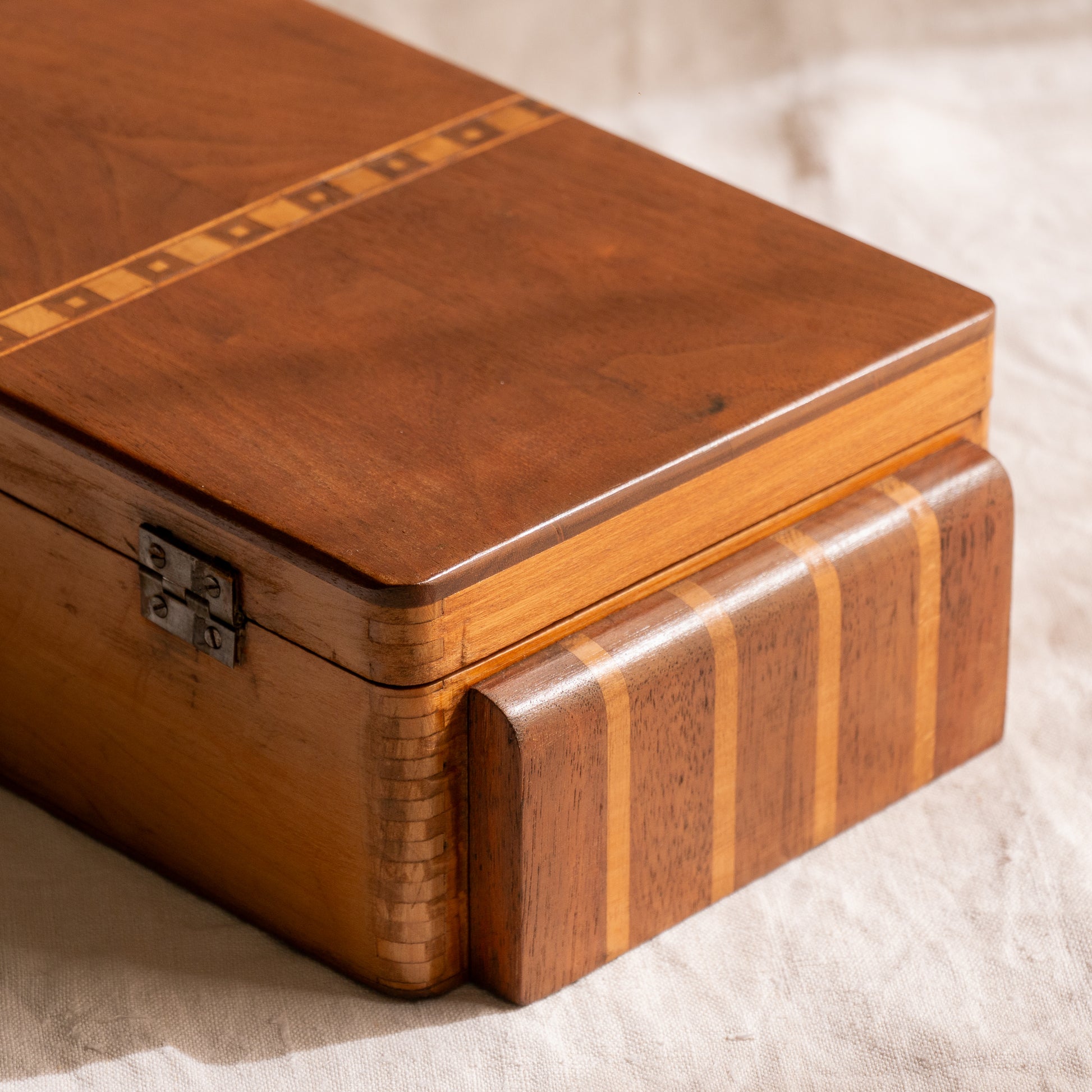 A beautiful French vintage wooden box, a hand-made piece with dove-tailed joints and inlaid design pattern - the colour of the wood is a wonderful golden brown and the hinges are strong. In summary a beautiful vintage box which makes an attractive piece of practical home decor.