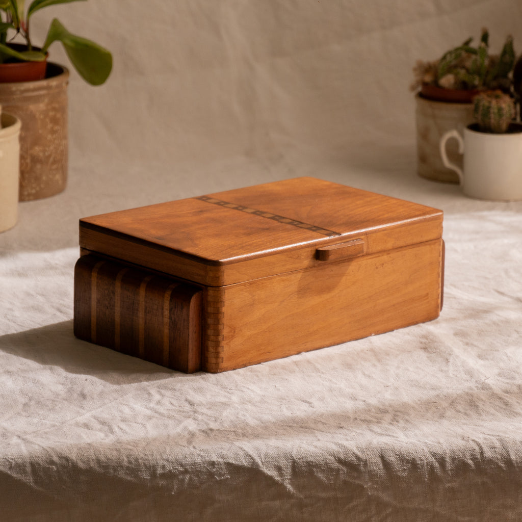 A beautiful French vintage wooden box, a hand-made piece with dove-tailed joints and inlaid design pattern - the colour of the wood is a wonderful golden brown and the hinges are strong. In summary a beautiful vintage box which makes an attractive piece of practical home decor.