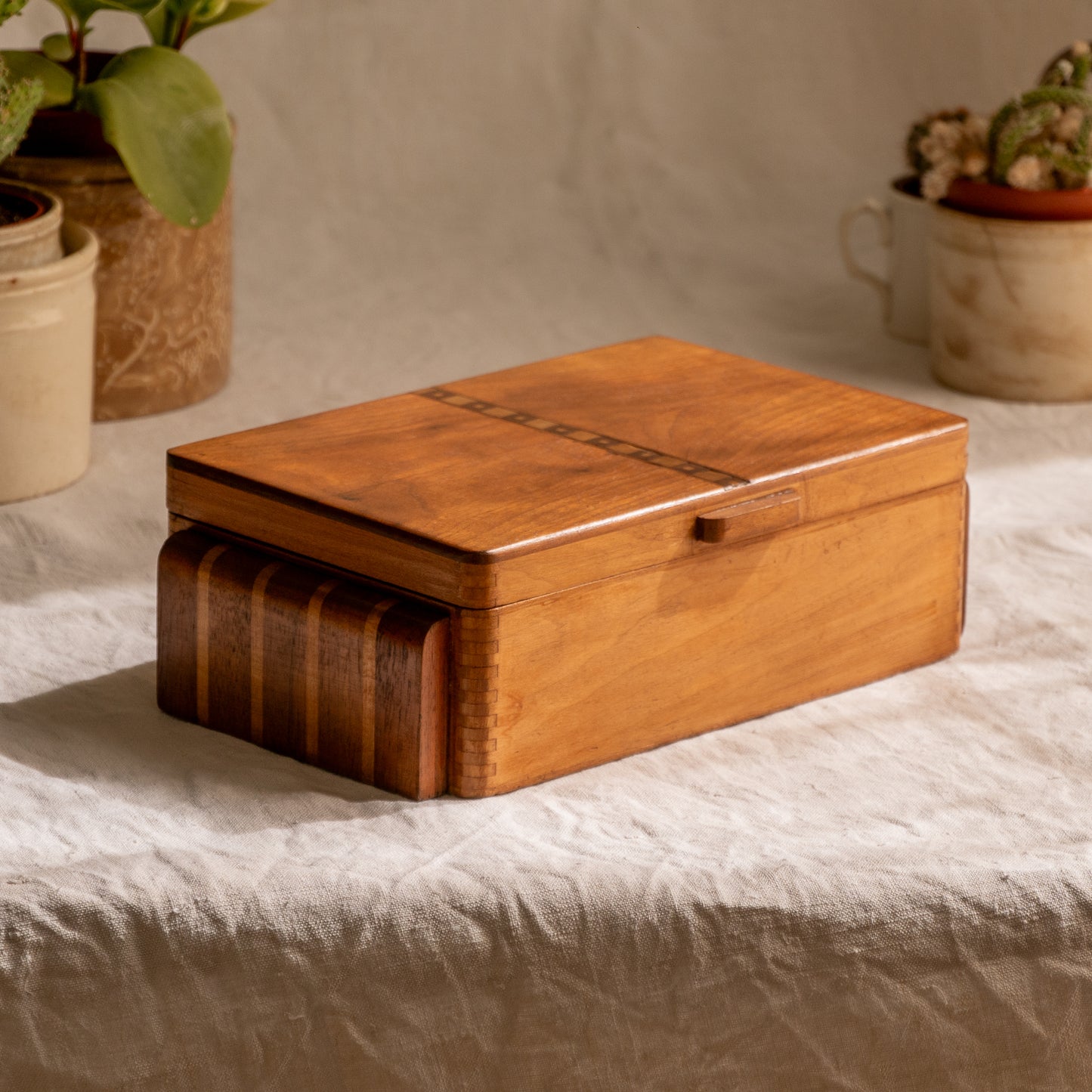 A beautiful French vintage wooden box, a hand-made piece with dove-tailed joints and inlaid design pattern - the colour of the wood is a wonderful golden brown and the hinges are strong. In summary a beautiful vintage box which makes an attractive piece of practical home decor.