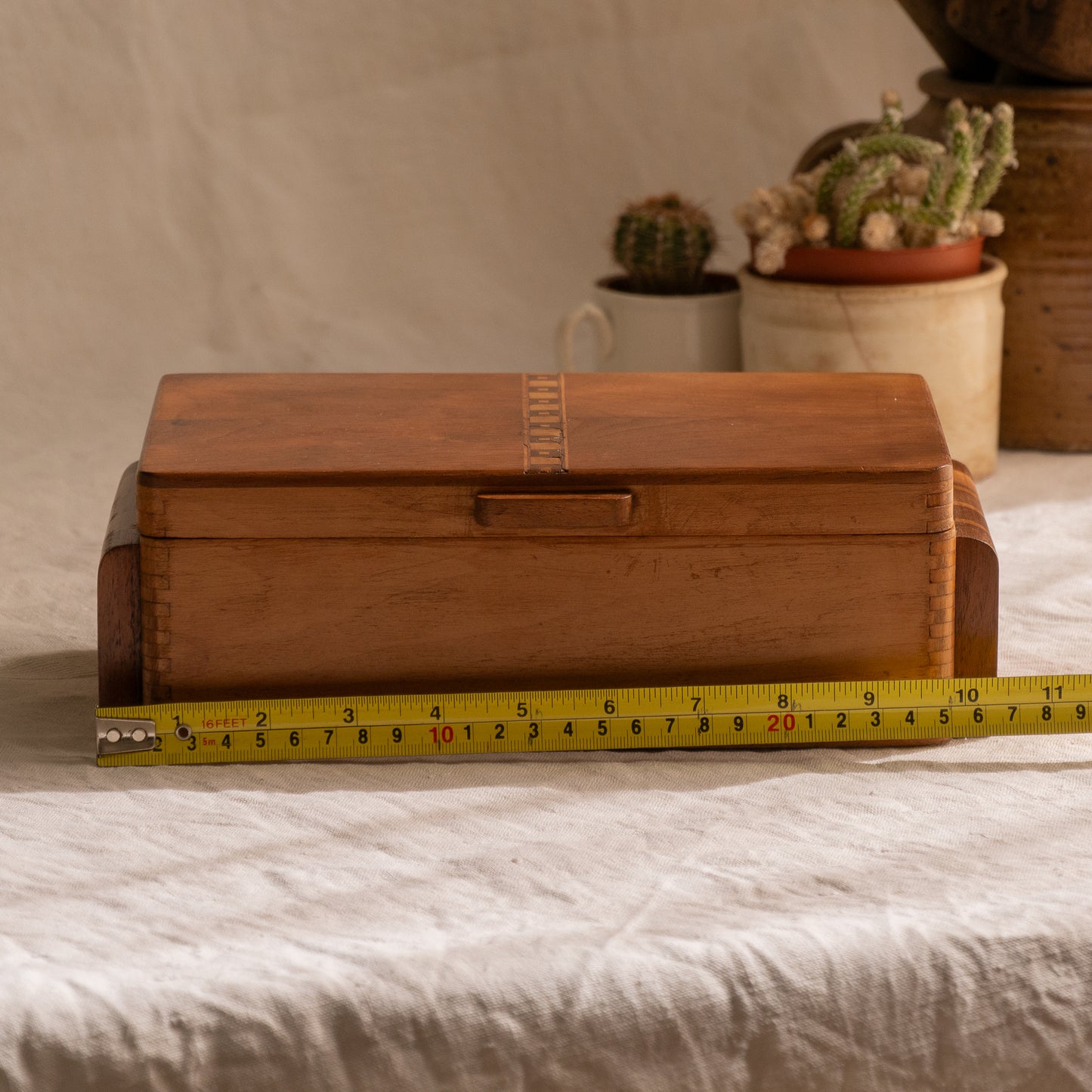 A beautiful French vintage wooden box, a hand-made piece with dove-tailed joints and inlaid design pattern - the colour of the wood is a wonderful golden brown and the hinges are strong. In summary a beautiful vintage box which makes an attractive piece of practical home decor.