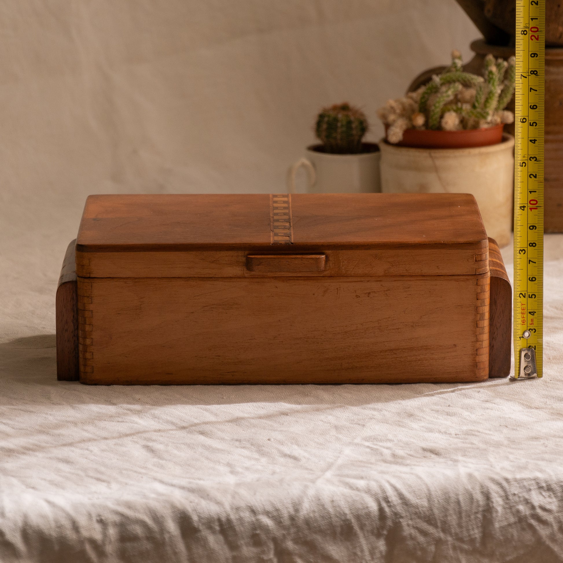 A beautiful French vintage wooden box, a hand-made piece with dove-tailed joints and inlaid design pattern - the colour of the wood is a wonderful golden brown and the hinges are strong. In summary a beautiful vintage box which makes an attractive piece of practical home decor.