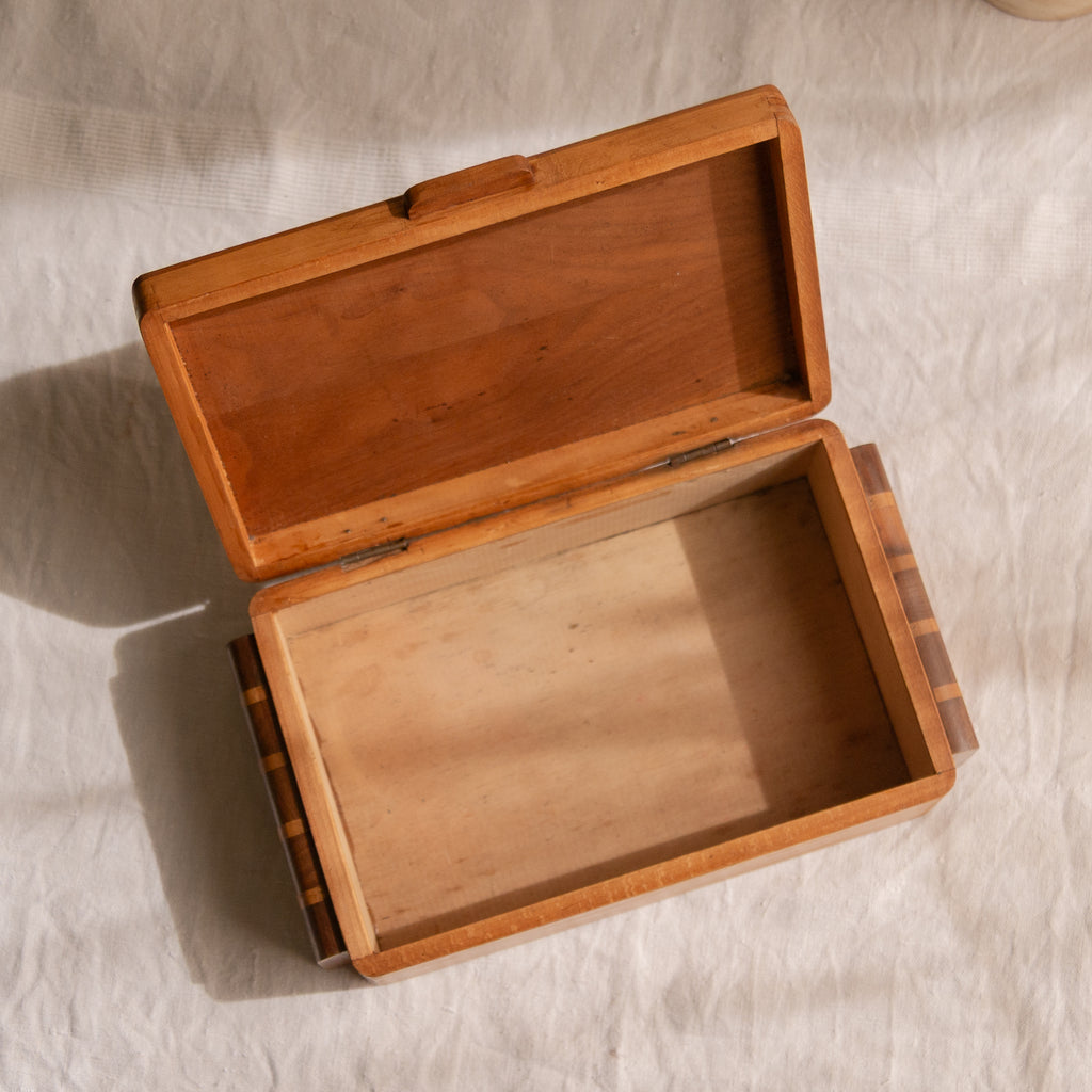 A beautiful French vintage wooden box, a hand-made piece with dove-tailed joints and inlaid design pattern - the colour of the wood is a wonderful golden brown and the hinges are strong. In summary a beautiful vintage box which makes an attractive piece of practical home decor.