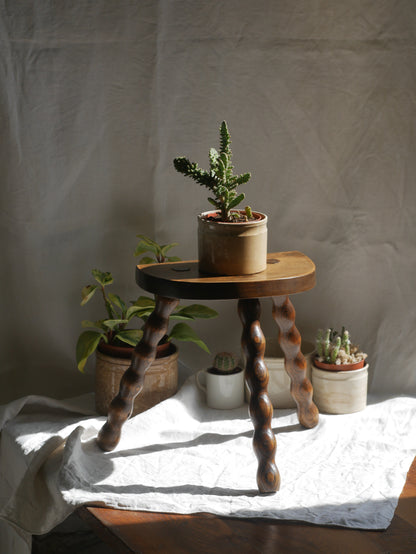 French vintage wooden stool with three turned wooden legs