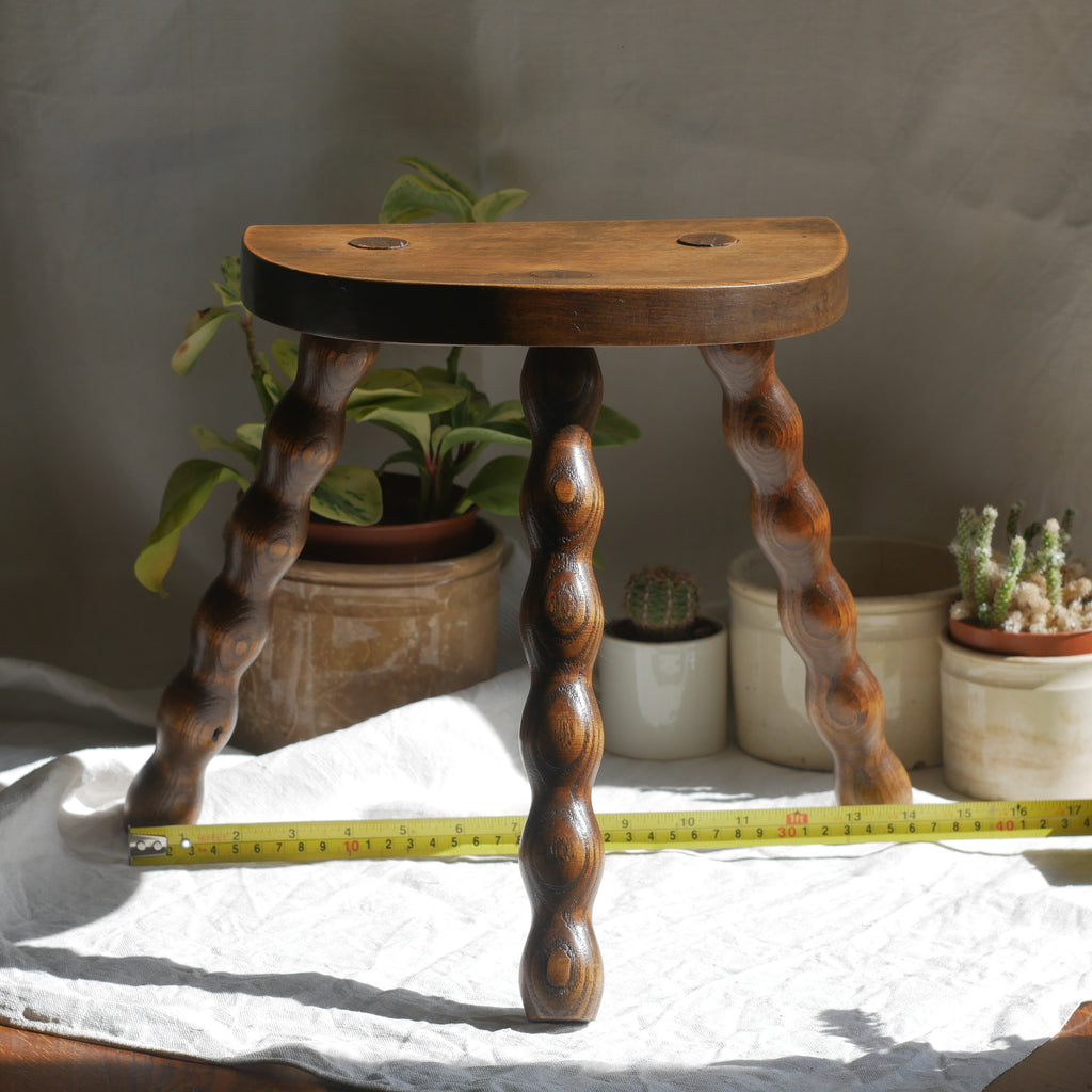 French vintage wooden stool with three turned wooden legs
