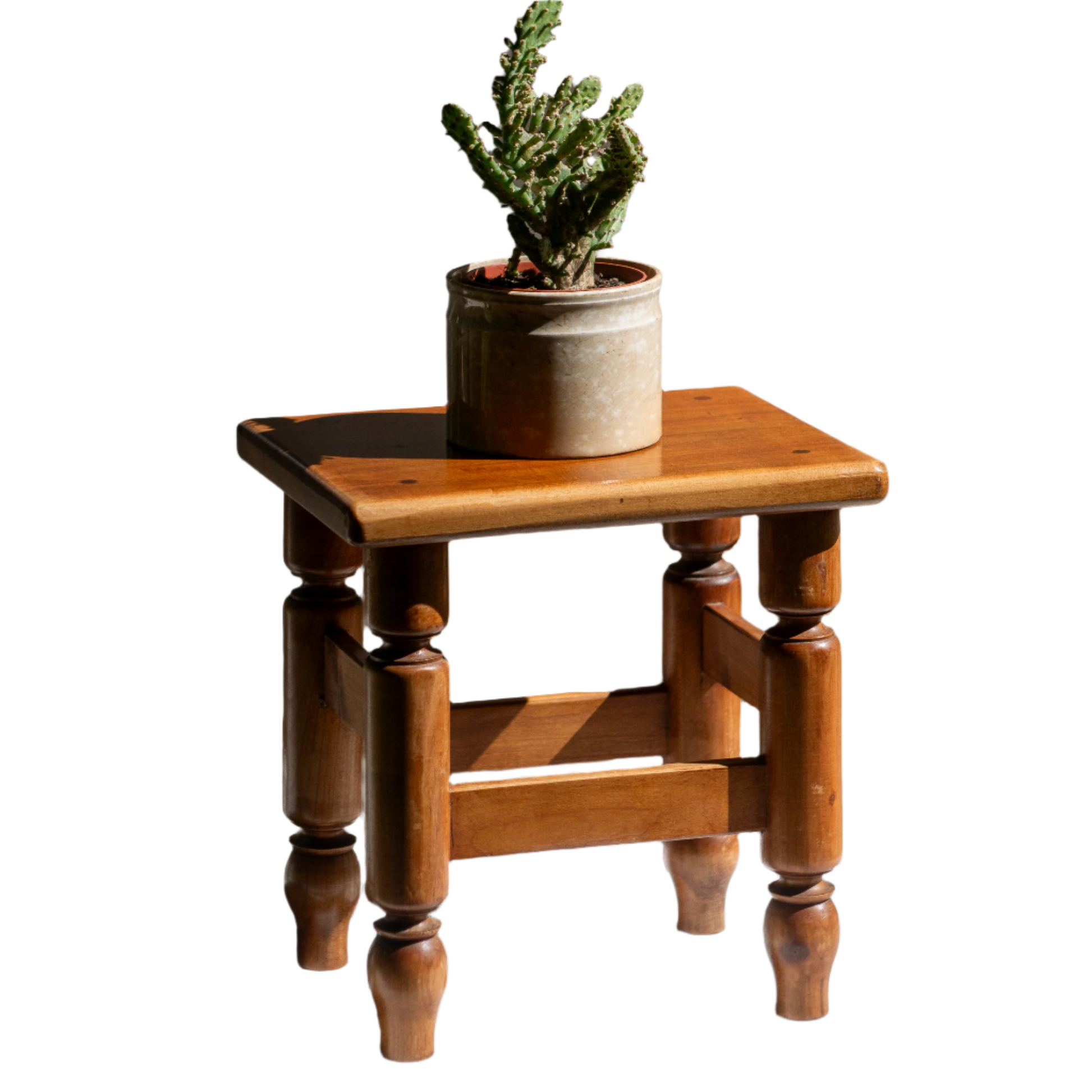 A handsome vintage French wooden stool in a lovely shade of honey-coloured brown. This old stool is very solid and would make a great plant stand (we currently use one on our desk as a plant stand and it looks great!) and many other decorative possibilities.