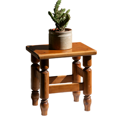 A handsome vintage French wooden stool in a lovely shade of honey-coloured brown. This old stool is very solid and would make a great plant stand (we currently use one on our desk as a plant stand and it looks great!) and many other decorative possibilities.