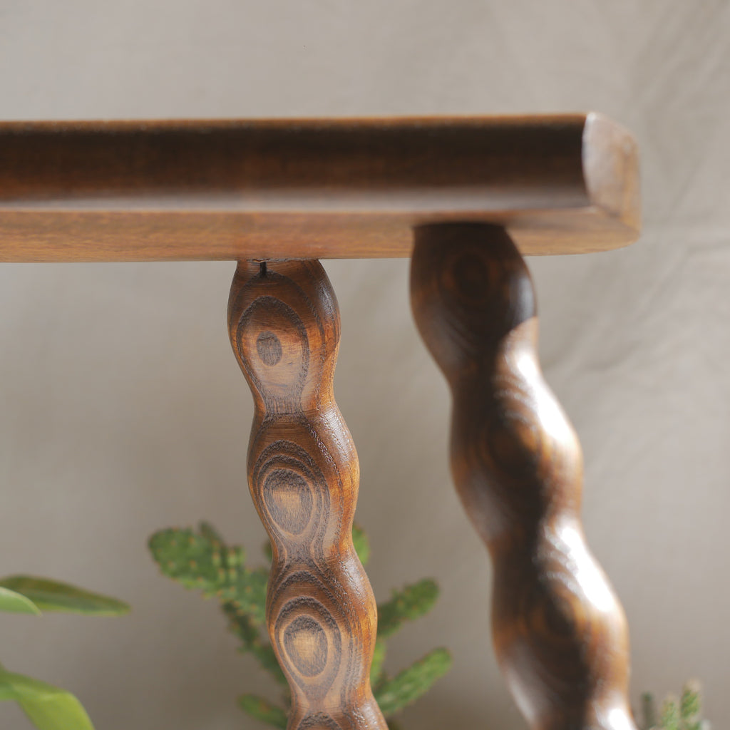 French vintage wooden stool with three turned wooden legs