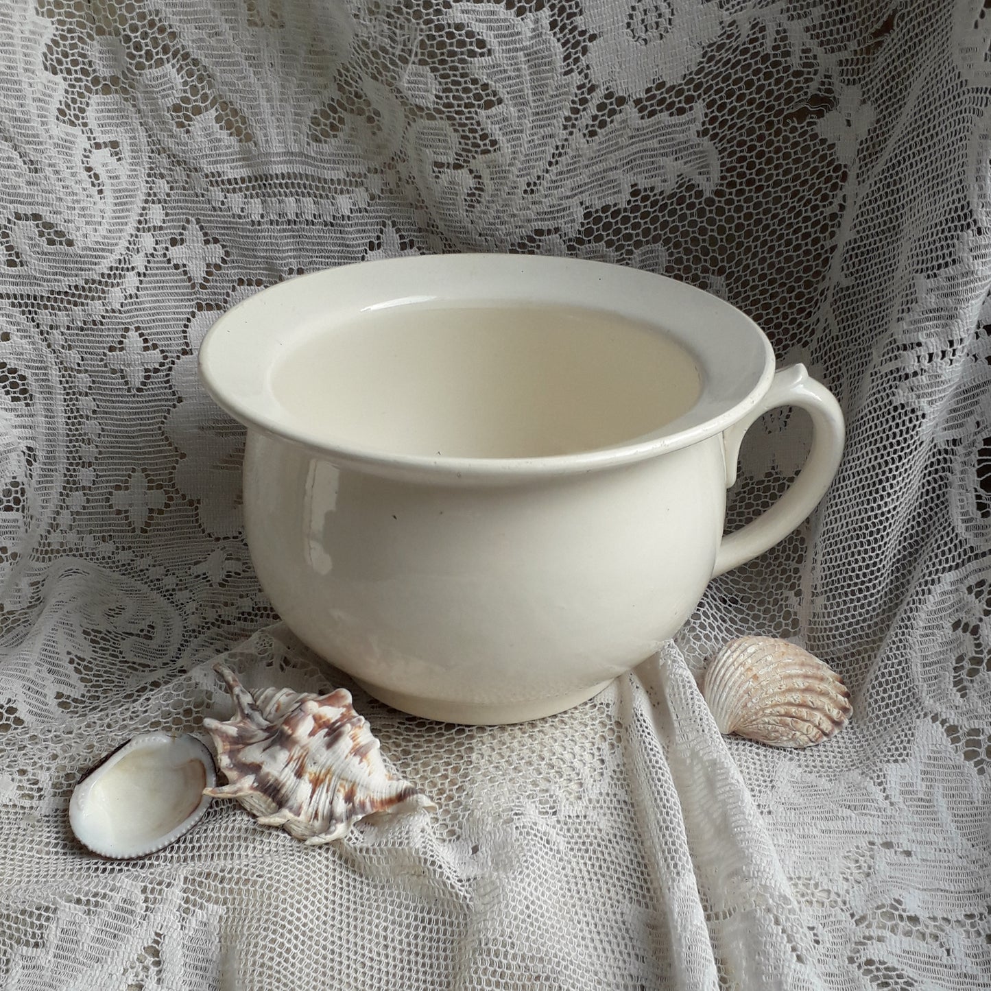 A nice little vintage ironstone white/cream chamber pot by premier French manufacturer, Sarreguemines, the perfect addition for a country home, bathroom decor, or even as a planter. Circa. 1920 - 1950.