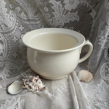 A nice little vintage ironstone white/cream chamber pot by premier French manufacturer, Sarreguemines, the perfect addition for a country home, bathroom decor, or even as a planter. Circa. 1920 - 1950.