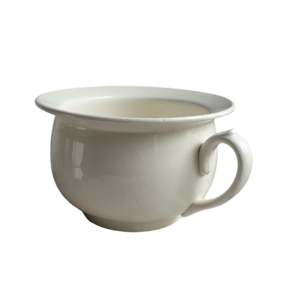 A nice little vintage ironstone white/cream chamber pot by premier French manufacturer, Sarreguemines, the perfect addition for a country home, bathroom decor, or even as a planter. Circa. 1920 - 1950.