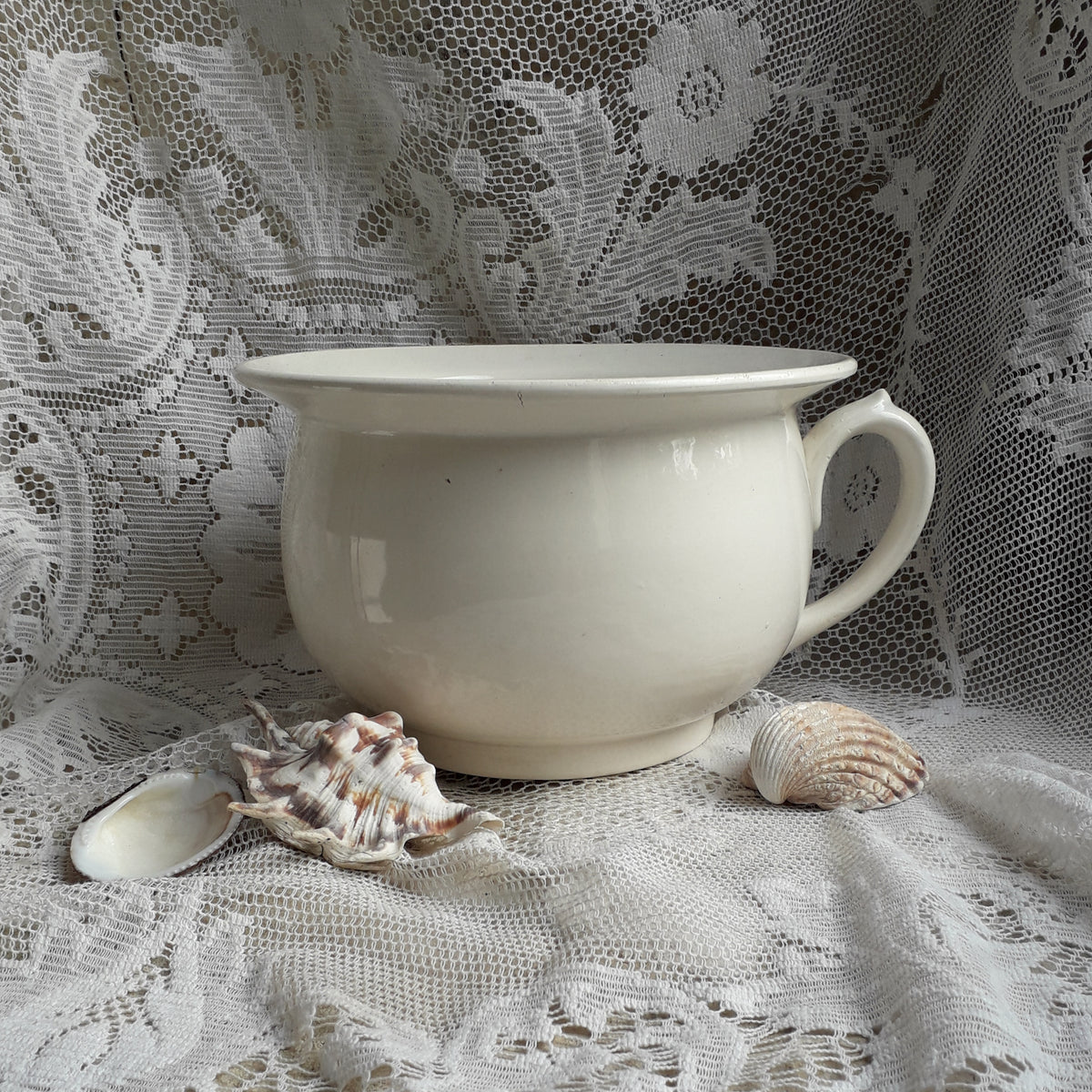 A nice little vintage ironstone white/cream chamber pot by premier French manufacturer, Sarreguemines, the perfect addition for a country home, bathroom decor, or even as a planter. Circa. 1920 - 1950.