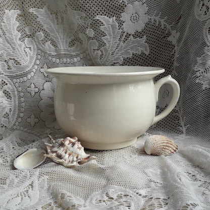 A nice little vintage ironstone white/cream chamber pot by premier French manufacturer, Sarreguemines, the perfect addition for a country home, bathroom decor, or even as a planter. Circa. 1920 - 1950.