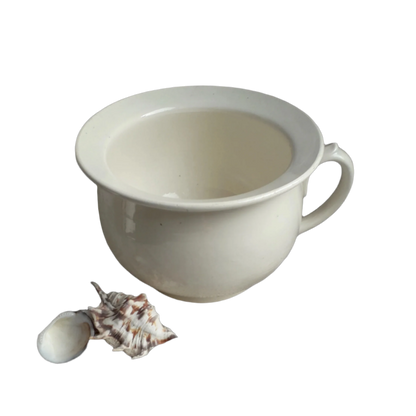 A nice little vintage ironstone white/cream chamber pot by premier French manufacturer, Sarreguemines, the perfect addition for a country home, bathroom decor, or even as a planter. Circa. 1920 - 1950.