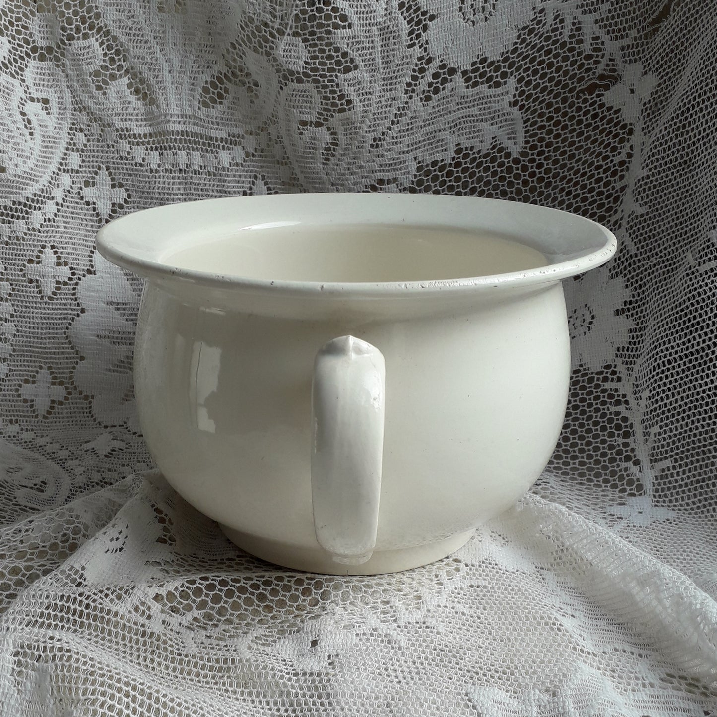 A nice little vintage ironstone white/cream chamber pot by premier French manufacturer, Sarreguemines, the perfect addition for a country home, bathroom decor, or even as a planter. Circa. 1920 - 1950.