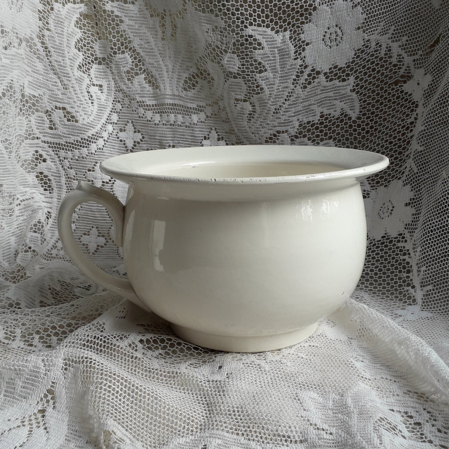 A nice little vintage ironstone white/cream chamber pot by premier French manufacturer, Sarreguemines, the perfect addition for a country home, bathroom decor, or even as a planter. Circa. 1920 - 1950.
